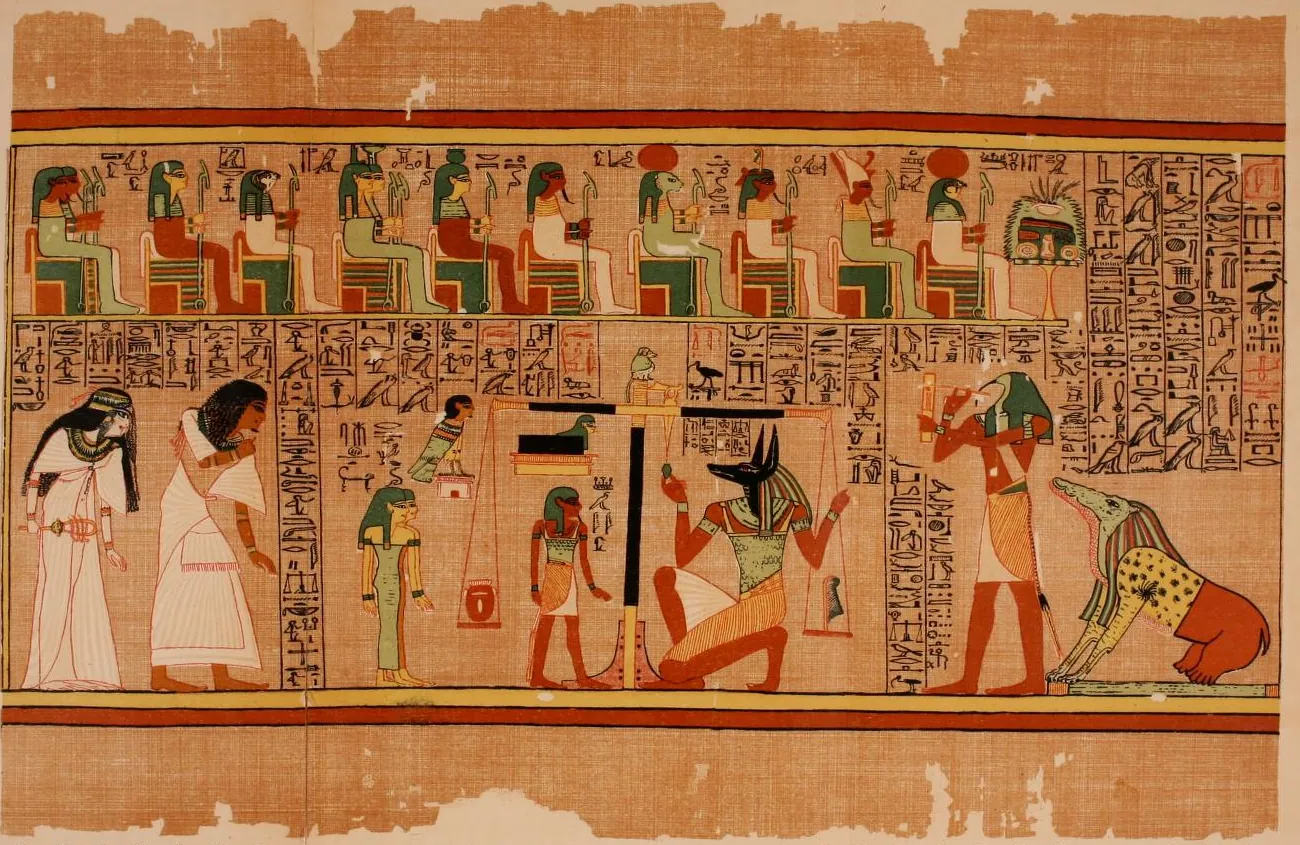 Planche 3 du papyrus d'Ani : douze dieux assis en haut ; en bas, Anubis à tête de chacal règle la balance où le cœur d'Ani est pesé contre la plume, devant Thot qui note et la dévoreuse